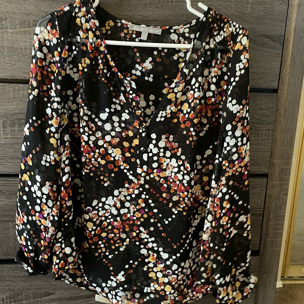 Daniel Rainn sheer women’s top. Multi-colored.